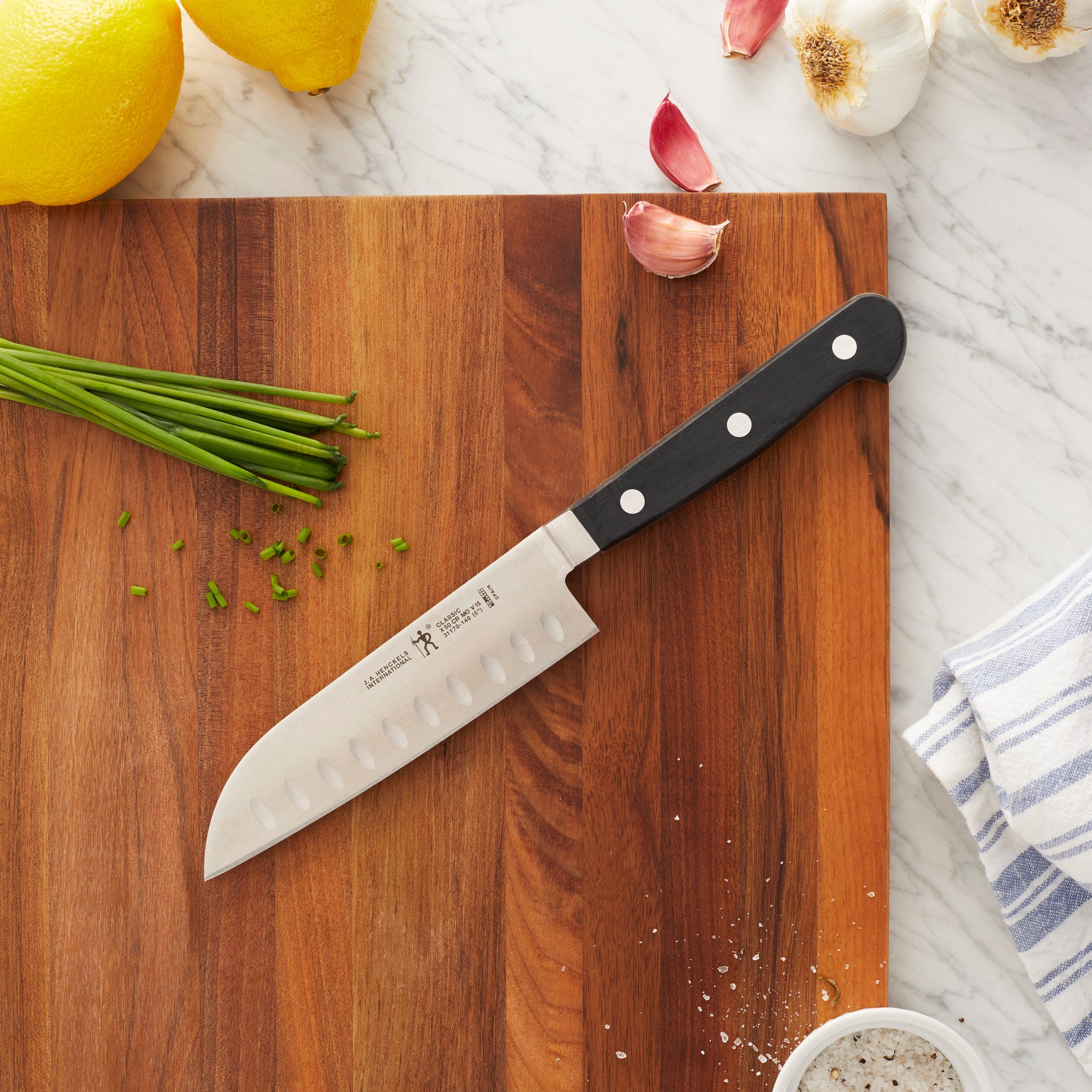 Henckels Classic 5-inch Hollow Edge Santoku Knife - Image 2