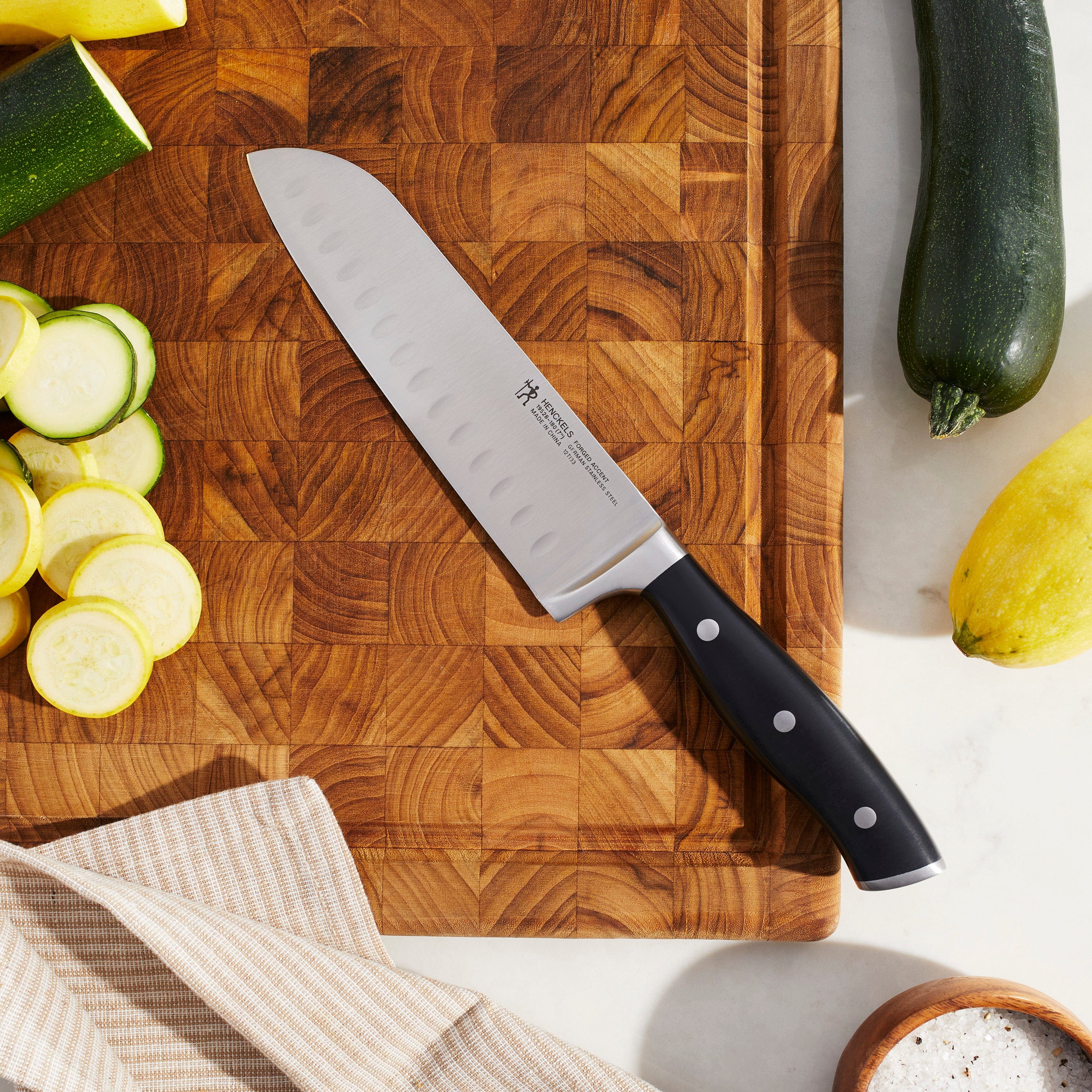 Henckels Forged Accent 7-inch Hollow Edge Santoku Knife - Image 2