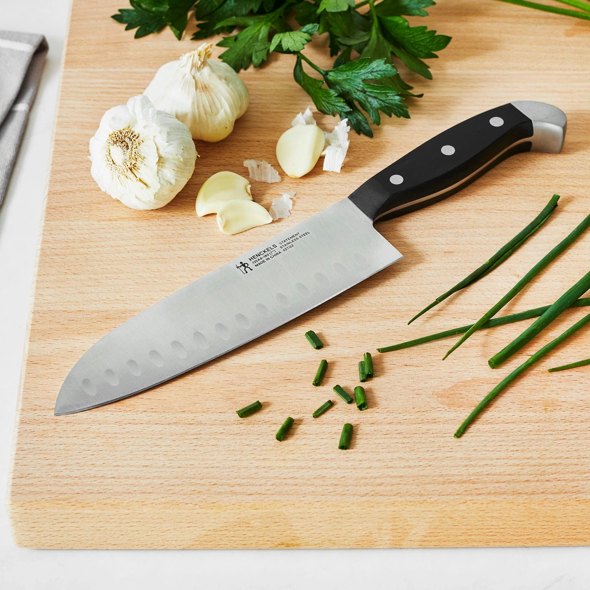 Henckels Statement 7-inch Hollow Edge Santoku Knife - Image 2